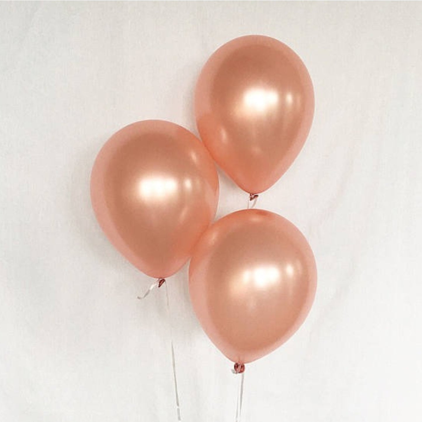 11 inch helium filled Metallic Rose Gold latex balloon