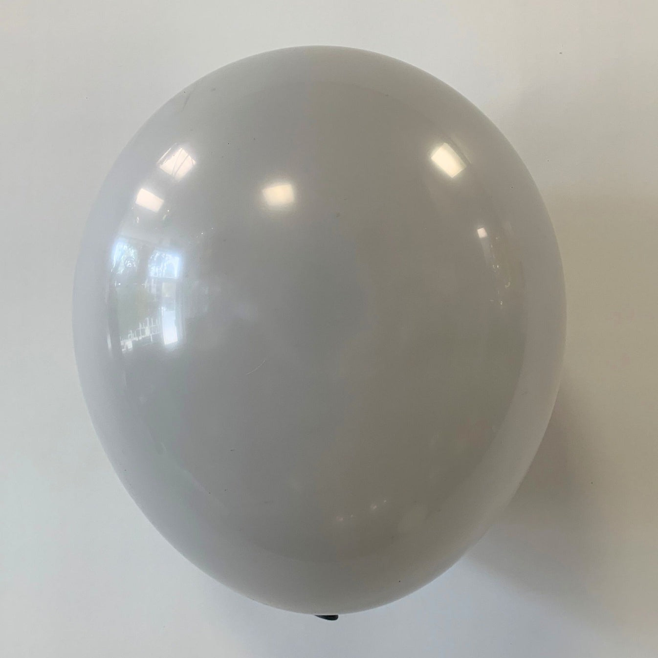 11 inch helium filled Grey latex balloon