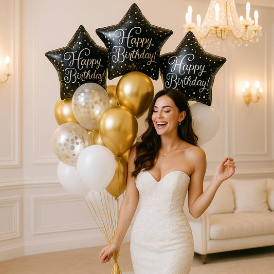 Woman in a white dress holding birthday balloons in a decorated room
