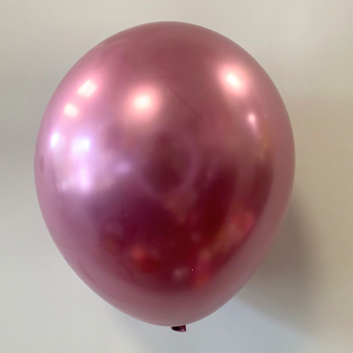 11 inch helium filled Chrome Mauve latex balloon