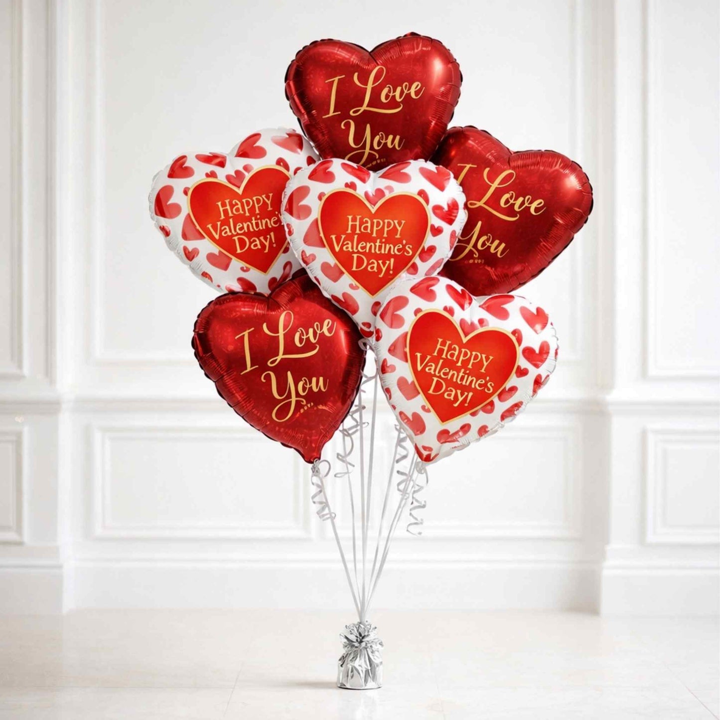 valentines balloon bouquet with red and hearts