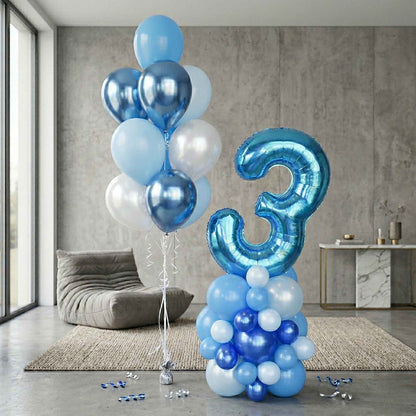 Blue and white balloons with a large number '3' in a modern living room.