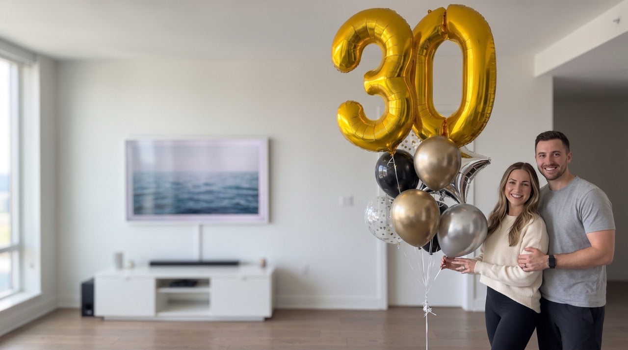 Load video: Luxury balloon bouquet number 26 displayed by a woman walking a runway, styled for an elegant celebration scene.