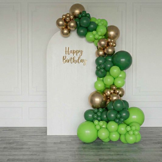 Balloon arch with green and gold balloons and 'Happy Birthday' text on a white board.
