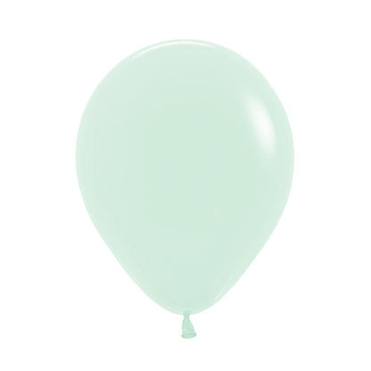 A single pastel green helium balloon