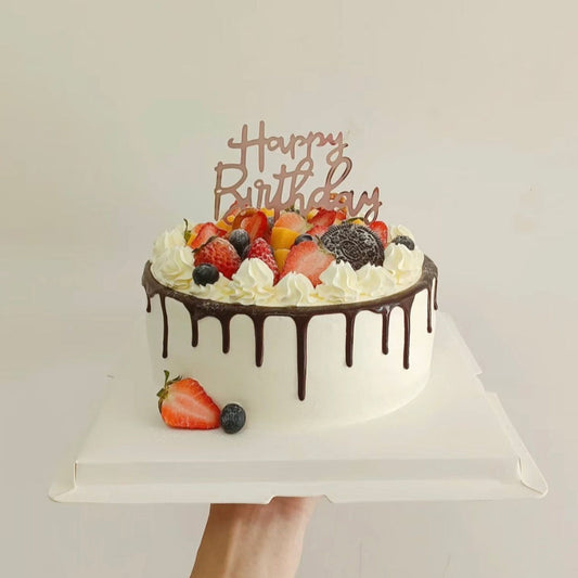 Classic Chocolate drip on fruits cake