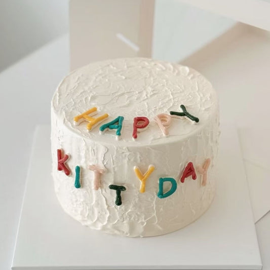 Fun Rainbow Letters White Birthday Cake