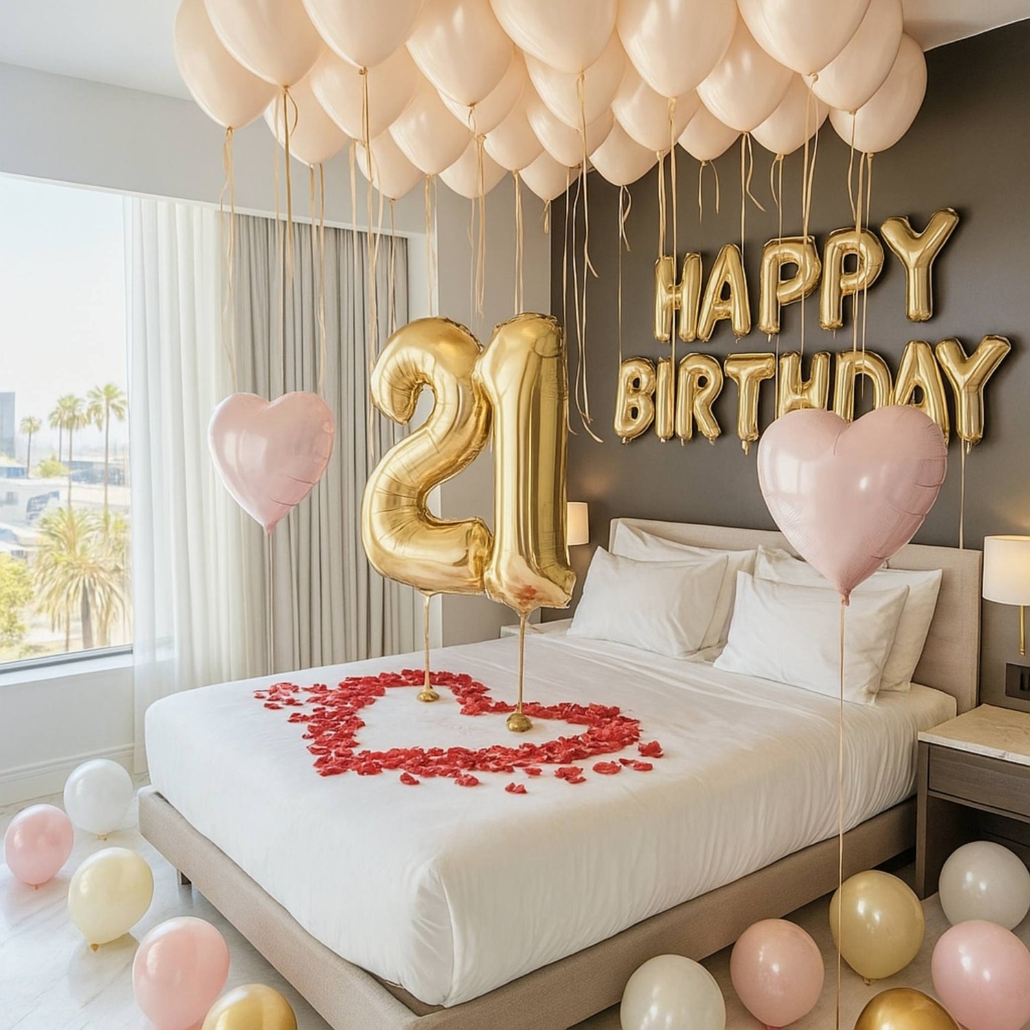 Decorated bedroom with balloons, 'Happy Birthday' and number '21' balloons, and rose petals on a bed.